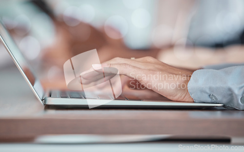 Image of Hands, laptop and research with a business woman typing a report for feedback in her office at work. Computer, email or internet with a female employee working on a network for a communication review