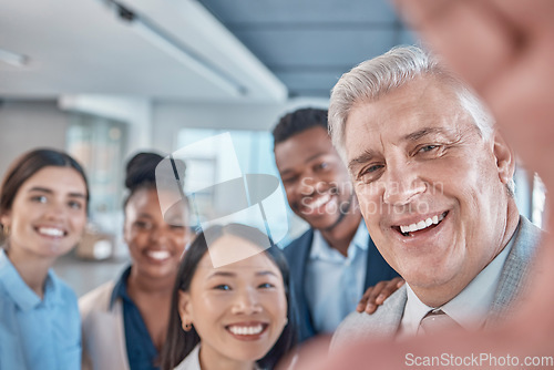 Image of Selfie, friends and a man ceo with his team posing for a profile picture in the office at work. Portrait, social media or leadership with a business manager taking a photograph with an employee group