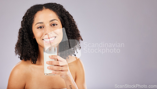 Image of Portrait, milk nutrition and black woman in studio isolated on a gray background mockup. Face, health and wellness of female with healthy drink for vitamin d, diet or skincare, beauty and calcium.