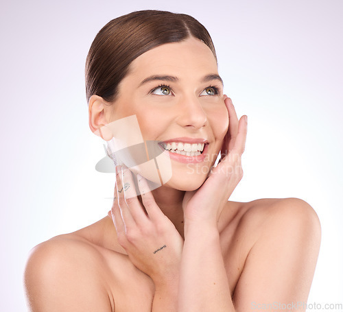Image of Skincare, happy and hands on face of woman in studio for grooming, cosmetics and wellness on gradient background. Beauty, smile and girl model relax in luxury, makeup and skin dermatology routine