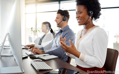 Image of Black woman, call center and consulting for telemarketing, customer service or support at office desk. African American female consultant or agent talking or explaining in contact us for help advice