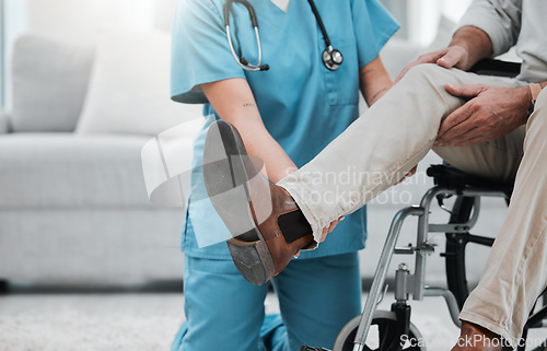 Image of Physiotherapy woman, senior man and wheelchair for legs rehabilitation, recovery or nursing home care. Physiotherapist expert, helping hand and elderly patient for injury, disability and hurt muscle