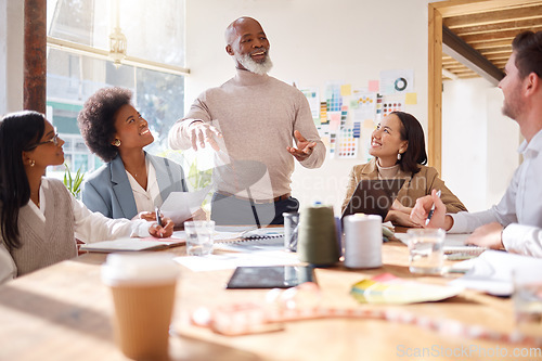 Image of Creative business people, meeting and planning in fashion design, brainstorming or strategy at office. Senior, black man or CEO talking to team of designers in teamwork collaboration for startup