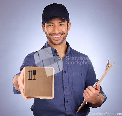 Image of Portrait of delivery man giving box isolated on studio background for courier services, clipboard and smile. Asian worker, business or logistics person package in Korea distribution and product offer