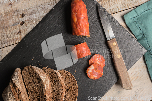 Image of Malt loaf bread and chorizo slices