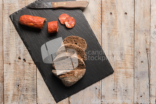 Image of Malt loaf bread and chorizo slices
