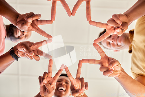 Image of Star hands, together and people teamwork, happy collaboration and group synergy or support from below. Career diversity of employees, community or friends with v sign for unity, workflow and solution