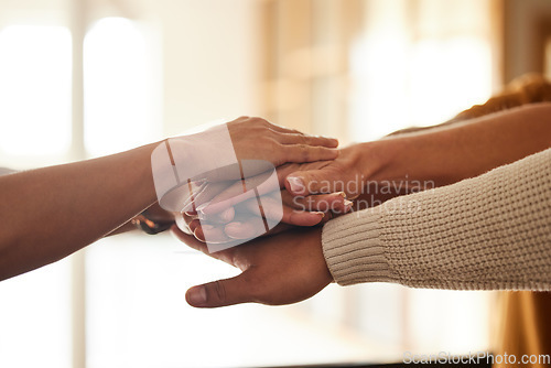 Image of Hands together, teamwork and collaboration for support, solidarity and team building in office. Cooperation, unity and group of business people stack hand or huddle for trust, motivation and union.