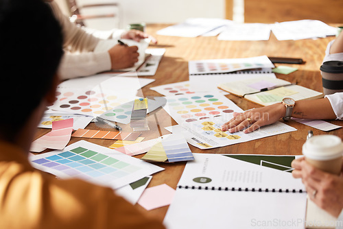 Image of Meeting, discussion and creative team planning a project together in office boardroom. Brainstorming, design and group of people working in collaboration with color swatches or palette in workplace.