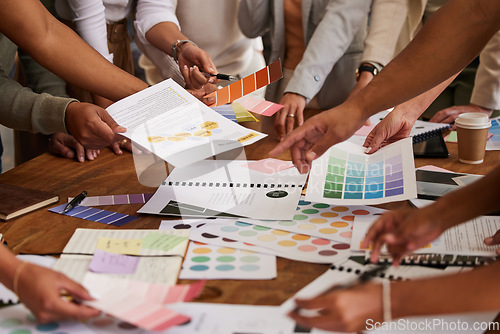 Image of Creative business people, hands and color palette in meeting, planning or brainstorming design strategy at office. Hand of group interior designers in teamwork, project plan or swatches for startup