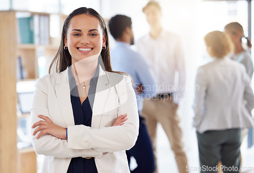 Image of Business woman, portrait and arms crossed for leadership in office, company and management in Atlanta. Happy female manager, worker and employee with corporate values for success, trust and pride