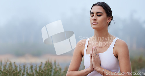 Image of Yoga, mockup or woman in prayer in nature for spiritual meditation, peaceful or for worship outdoors. Fitness, lotus or healthy girl relaxing in balanced exercise to meditate with mindfulness freedom