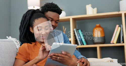 Image of Black couple, tablet and happy man and woman browsing the internet, doing online shopping or enjoying streaming service subscription. Lovers enjoying social media mobile app with 5g home wifi network