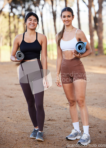 Image of Portrait, yoga and exercise with woman friends in the forest for wellness, mental health or spiritual balance. Health, nature or diversity with a young female yogi and friend outdoor in the woods