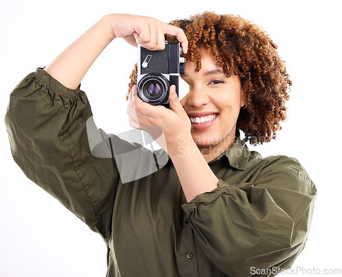 Image of Photographer, portrait and woman using camera for a photoshoot isolated in studio white background. African American, black person and creative photography with picture or photo production