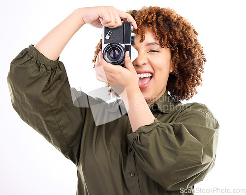 Image of Fun, photo and portrait of a black woman with a camera isolated on a white background in a studio. Excited, professional and photographer filming, shooting and being paparazzi with equipment