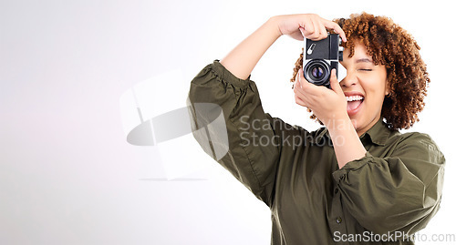 Image of Photographer, photography and woman using camera taking picture or photo isolated in studio white background. African American, black person and creative photoshoot as production employee with mockup