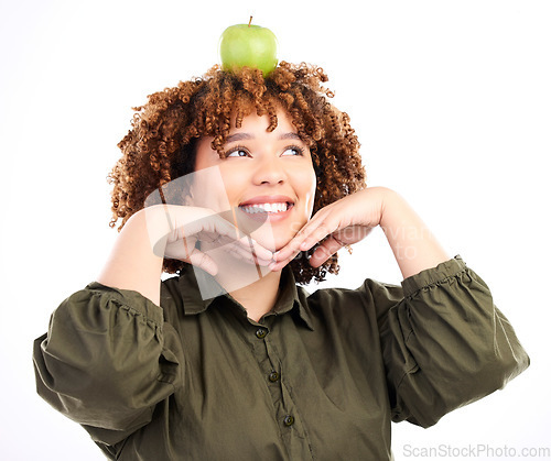 Image of Apple, face and happy black woman with fruit product for weight loss diet, healthcare lifestyle or body detox. Wellness food, nutritionist smile and vegan studio model isolated on white background