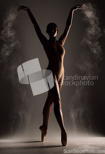 Image of Powder, ballet and silhouette of ballerina on dark background for performance, dancing and training. Theatre mockup, creative art and isolated woman for dance routine, practice and balance in studio