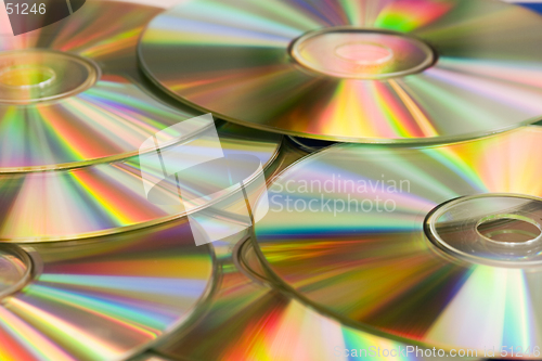 Image of cd's in golden reflections