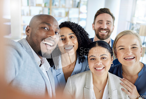 Image of Happy, smile and selfie with business people in office for teamwork, support and diversity. Solidarity, community and collaboration with portrait of group of friends for picture, positive or workshop