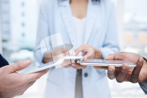 Image of Business people, hands and phone for team networking, data share or syncing together in the city. Hand of group on mobile smartphone display for social media, app sync or sharing network information