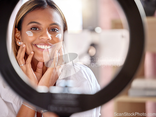 Image of Black woman influencer, skincare cream and streaming tutorial for portrait, smile and beauty on social media. Gen z girl, digital cosmetic expert or online makeup education for face product on web