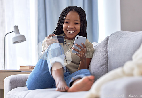 Image of Online shopping, credit card and black woman with phone on sofa for financial banking, ecommerce and fintech. Happy customer in house for mobile finance, digital money and fast food delivery payment