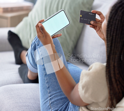 Image of Phone screen, hands and mockup with credit card for online shopping, marketing or advertising. Fintech, ecommerce and black woman with mobile smartphone for payment and product placement in house.