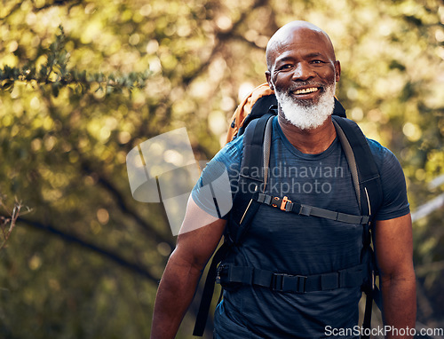 Image of Happy, hiking and portrait of black man in forest for freedom, health and sports training. Exercise, peace and wellness with senior hiker trekking in nature for travel, summer break and adventure