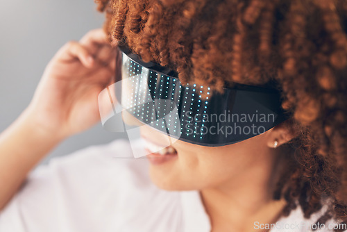 Image of Futuristic vision, glasses and black woman isolated on gray background metaverse, cyberpunk and virtual reality. VR sunglasses, digital fashion and ai high tech of gen z model or person future gaming