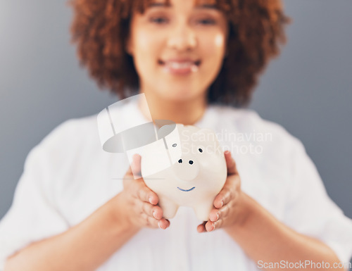 Image of Finance, piggy bank or black woman with savings budget or financial profits growth on blurred background. Happy, portrait or African American girl with tin container for cash loan or money investment