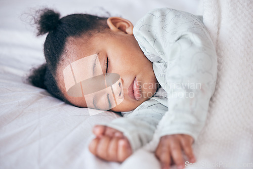 Image of Black girl, baby and sleeping in bedroom, home and nursery room for peace, calm and dreaming at nap time. Tired young female kid asleep for resting, break and healthy childhood development in house
