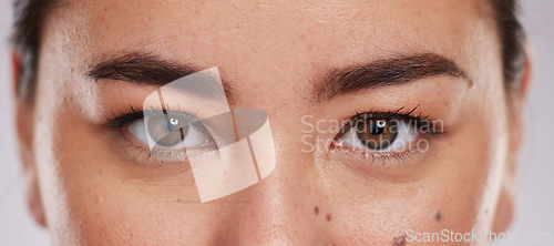 Image of Asian, eyes and face with vision and beauty, microblading with lashes, contact lens and eye care zoom. Makeup, eyeliner with eyebrow, portrait and skin with optometry, cosmetics and female in studio