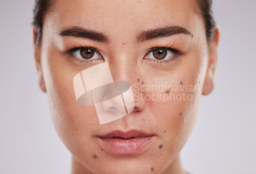 Image of Portrait, skincare and woman in studio for beauty, grooming and cosmetic on grey background. Face, natural and asian girl model relax with luxury, wellness and skin, treatment and pamper routine