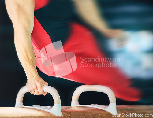 Image of Horse, gymnastics and motion blur with the hands of a man training for an olympics event or sports. Exercise, balance and speed with a male athlete or gymnast in a studio or gym for competitive sport