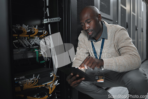 Image of Data center or black man on tablet in server room on database maintenance or software update. Cybersecurity, it or startup male coder on technology for cloud computing, programming or web networking