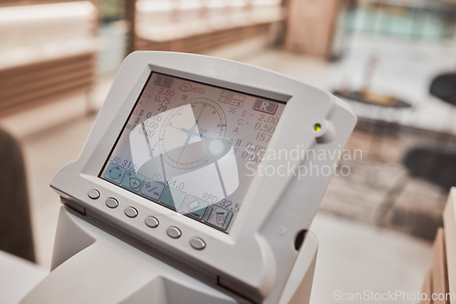 Image of Optometry, healthcare and screen for an eye test in a clinic for eye care, health or wellness. Ophthalmology, medical and digital machine for a vision exam or eyesight assessment in a optical store.