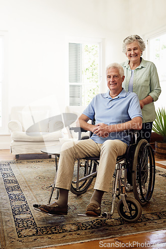 Image of Disability, smile and portrait of senior couple at home for marriage, quality time and bond together. Retirement, wheelchair and happy elderly woman and man in living room to relax, support and love