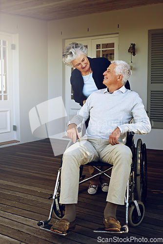 Image of Wheelchair, retirement and happy senior couple enjoy bonding, quality time and marriage on outdoor patio. Disability, love and elderly man and woman smile for support, wellness and relax at home