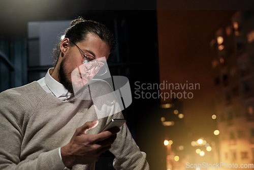 Image of Smartphone, city and business man at night for internet research, mobile app and social media on balcony. Technology, communication and male with phone for writing email, networking and online chat