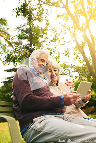 Image of Video call, park and senior couple with a tablet for communication, 5g internet and a movie. Nature, hug and elderly man and woman with technology for social media and reading an email in Argentina
