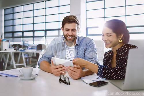 Image of Collaboration, tablet and man with woman in reading email in creative office sharing idea or opinion at meeting. Teamwork, planning and happy employees in discussion at tech startup or design agency.