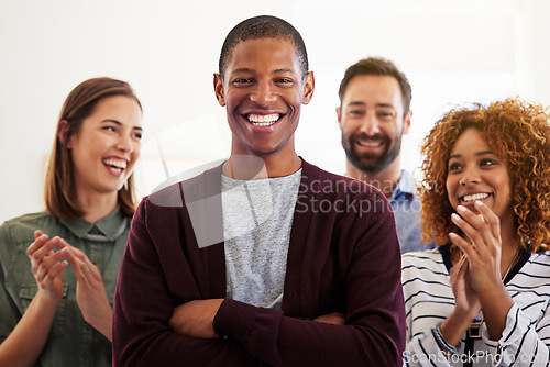 Image of Success, applause and portrait of black man in office for celebration, teamwork and achievement. Support, happy and smile with business people for motivation, appreciation and winner in startup