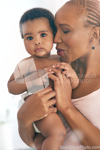 Image of Mother, baby and black family together for love, care and support for growth and development. Happy woman and infant child in house for bonding, security and to relax with mama on mothers day