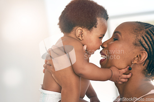 Image of Smile, touch and nose with mother and baby for bonding, affectionate and connection in family home. Kindness, happiness and happy with black woman holding child for positive, growth and support