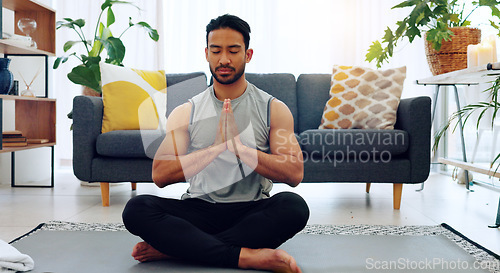 Image of Yoga, namaste man and living room exercise for zen meditation and mental relaxation time in home. Peaceful, spiritual and fitness wellness routine for calm mindset and stress free lifestyle.