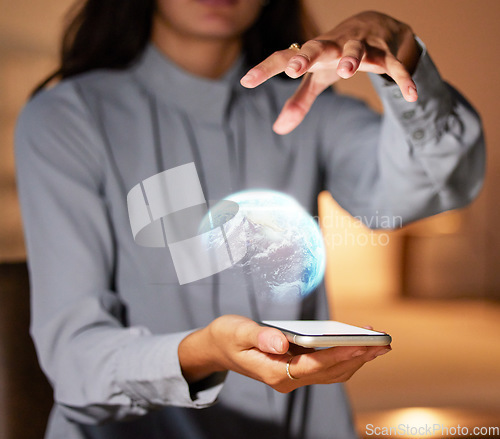 Image of Woman, hands and phone with 3D hologram of globe for global communication, networking or technology at night. Hand of female holding smartphone with holographic earth for futuristic tech innovation