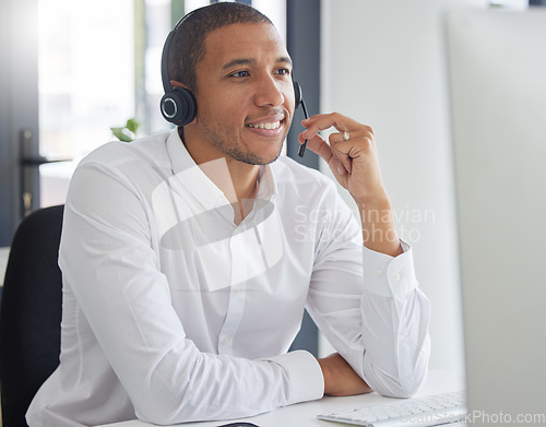 Image of Call center, computer and consulting with man in office for customer service, contact us and sales. Help desk, operator and advisory with employee for communication, technical support and hotline