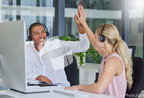 Image of High five, call center and teamwork with people in office for deal, success and customer service. Collaboration, consulting and celebration with man and woman for help desk, advisory and victory